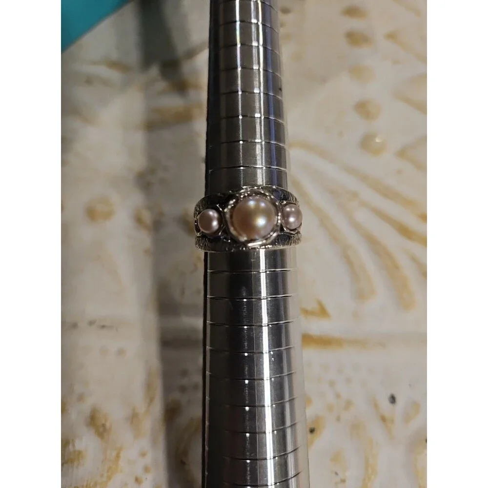 Paz (PZ) Israel sterling silver ring featuring three pearls